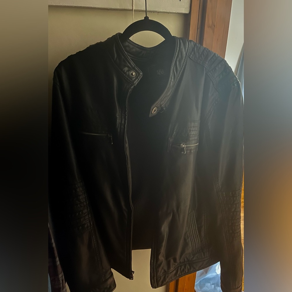 Rock and Republic black leather jacket with fleece inside.
